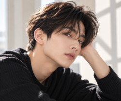 Modern men's layered haircut with textured movement